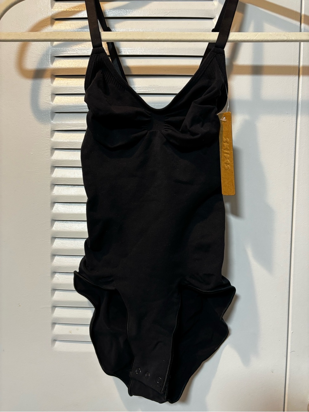 SKIMS Seamless Sculpt Brief Bodysuit in the shade Onyx